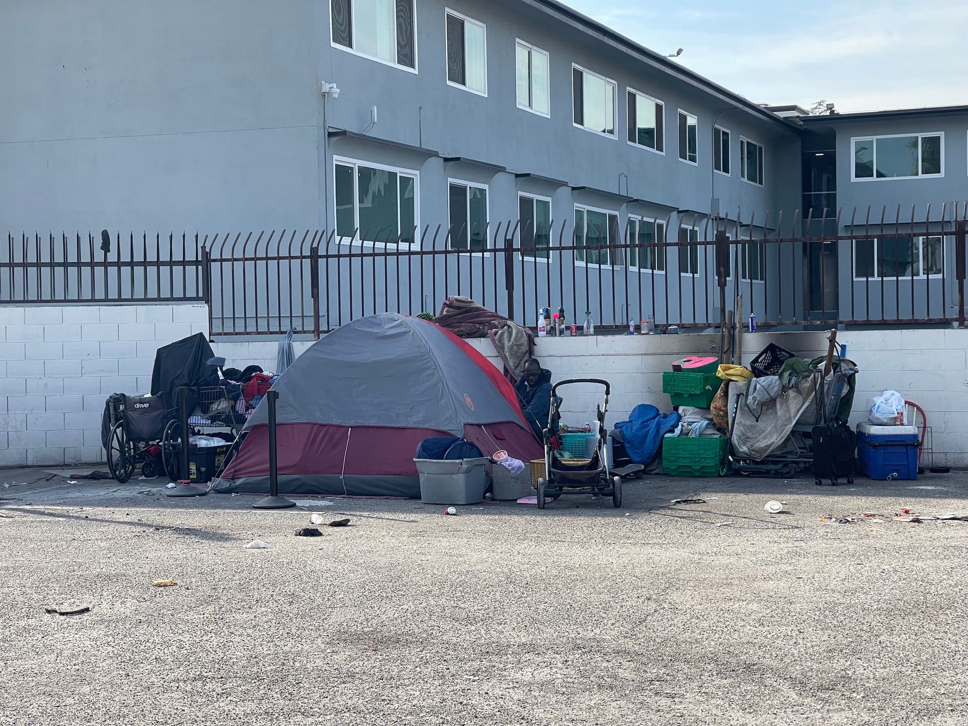 An encampment along a Fresno street — the work still ahead